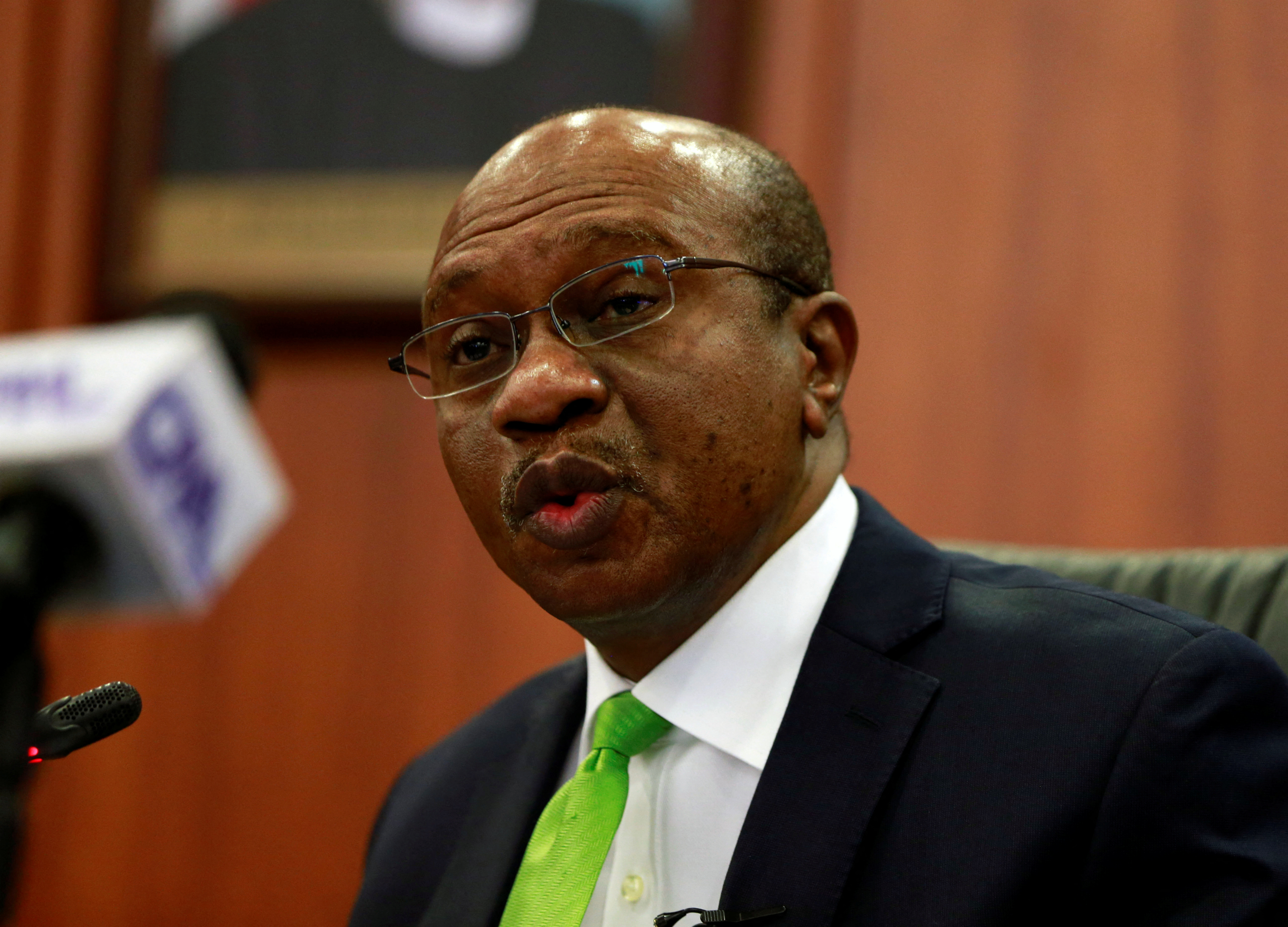 Nigeria's Central Bank Governor Godwin Emefiele briefs the media during the MPC meeting in Abuja