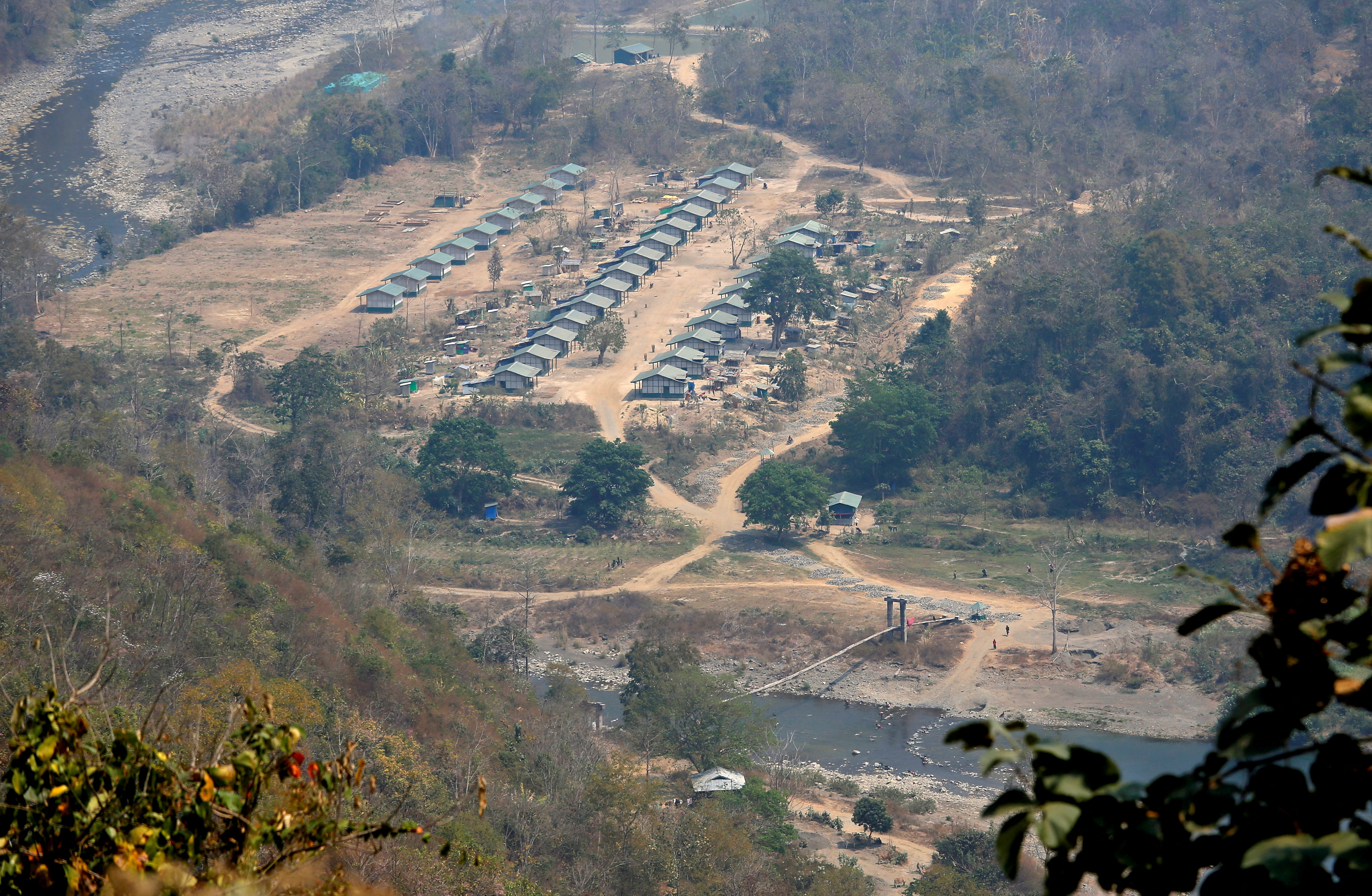 A general view of a camp of the Myanmar ethnic rebel group Chin National Front is seen on the Myanmar side of the India-Myanmar border close to the Indian village of Farkawn